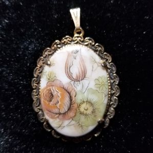 VINTAGE gold tone floral decal pendant
